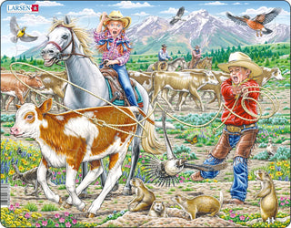 Cowgirl og cowboy med lasso